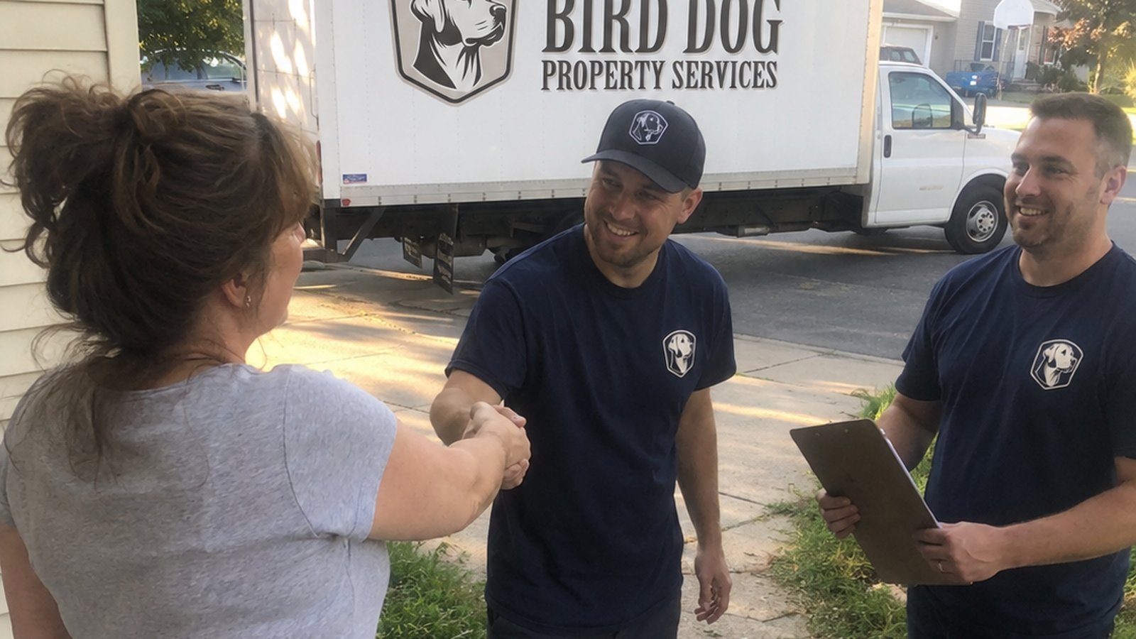 Bird Dog owner moving a refrigerator out of a Raleigh home
